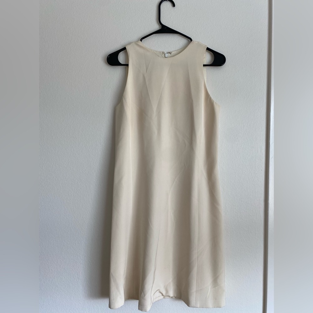 Beautiful and vintage 100% silk cream A-Line sleeveless dress.